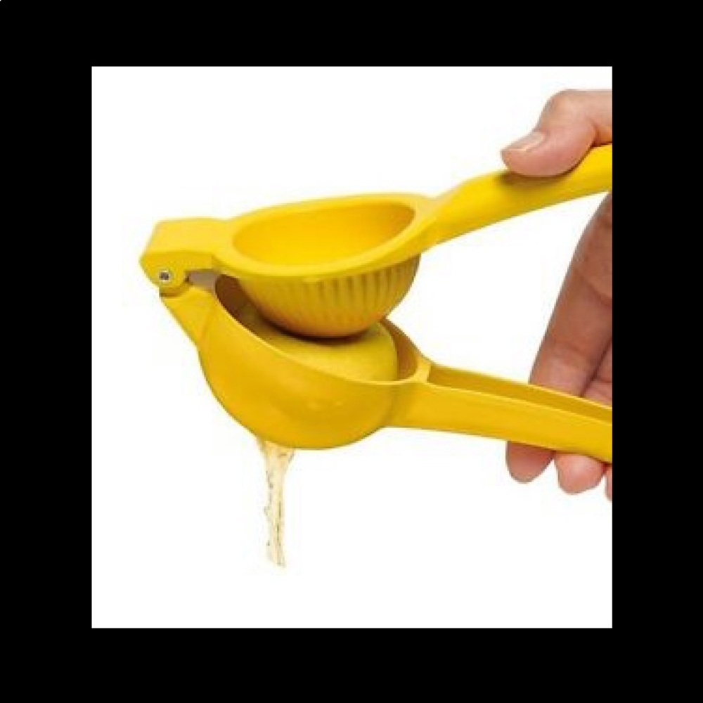 🍋Stoli metal fruit squeezer🍋